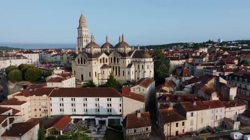 Aerial view of Périgueux and Saint Front Cathedral at sunrise on the banks of the Isle River, Romane