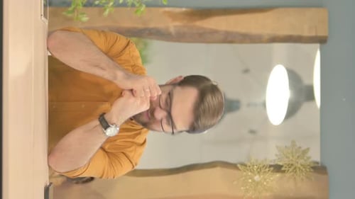 Adult Man Talking at Table