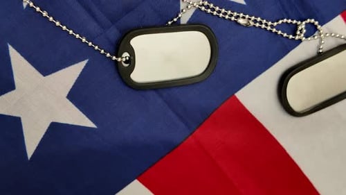 American Flag with Dog Tags Close Up Panning