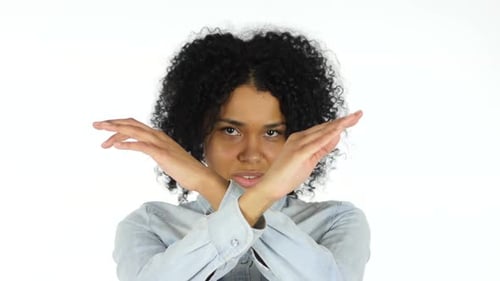 Young Woman Making Arms Cross Reject Gesture