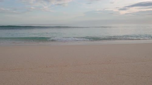 Calm Tropical Beach with White Sand and Slow Motion Waves