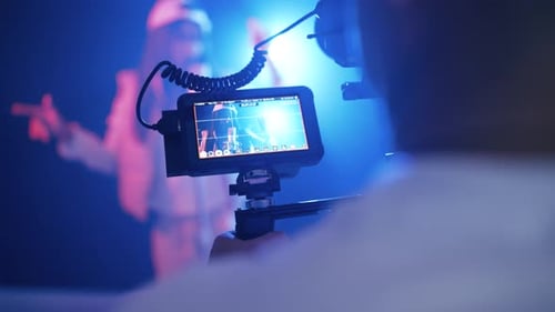 Filming a Musician in a Studio Setting