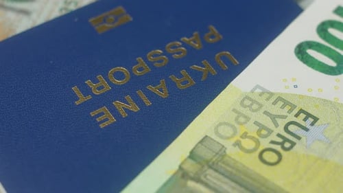 Banknotes Euro Dollar and Passport Closeup Negotiating Table of Ukraine with Euro Union and Usa
