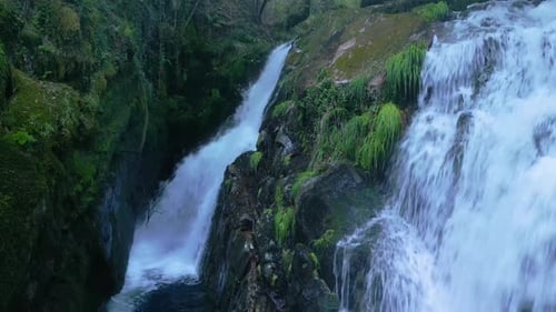 Foamy Cascades Of Santa Leocadia Waterfall In Mazaricos, Galicia Spain. Aerial Drone Shot