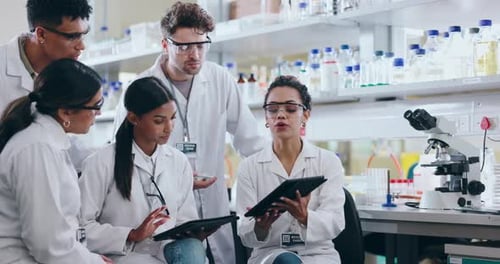 Scientists Collaborate on Research in Modern Laboratory