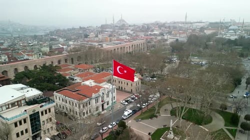 Aerial View of Cityscape with Turkish Flag