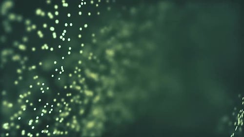 Dust particles flicker on a green background. abstract photo background for text