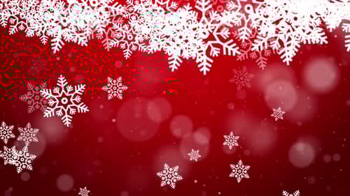 Schnee fällt in den blauen Himmel mit roten Partikeln im Winter Weihnachten