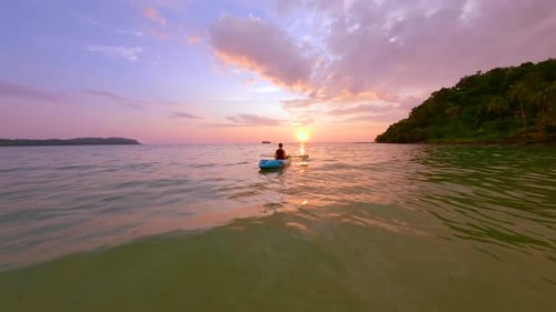 Woman Kayaking on Calm Tropical Sea at Sunset Thailand Travel Freedom Concepts