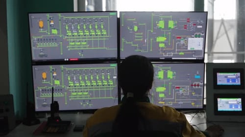 Industry 40 Modern Factory Multiple Monitors with Control Panel of a Modern Enterprise Fully