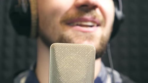 Young Man Emotionally Recording New Song Working of Creative Musician Male Singer in Headphones