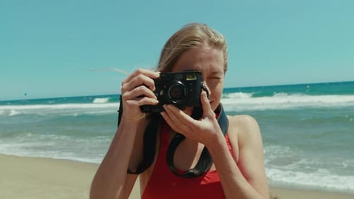 Female Tourist Photographer Take Photo at Beach