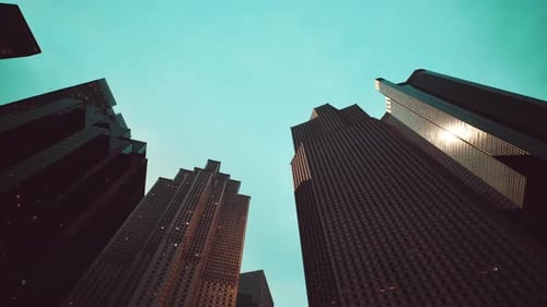 Tall Buildings Towering Over a Bustling Cityscape