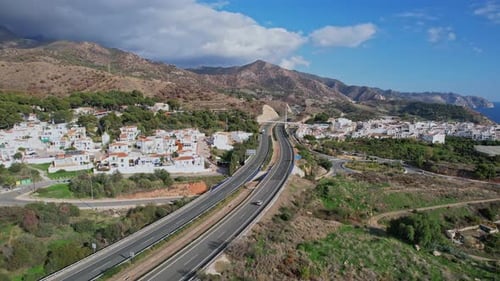 Traffic on a spanish road with cars driving seen from above aerial view