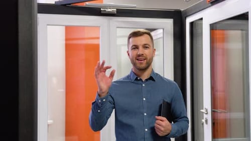 Friendly Manager in Window Shop