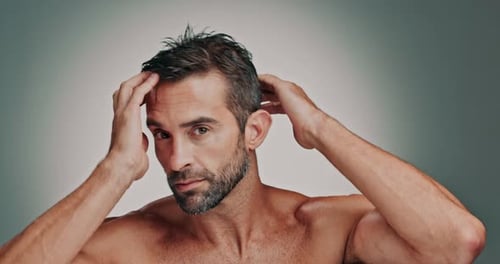 Studio, man and face with smile for hair care, wellness and satisfaction with collagen treatment