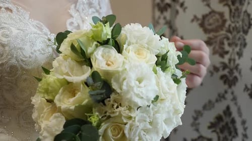 Bride Holding Creamy White Wedding Bouquet, Close Up