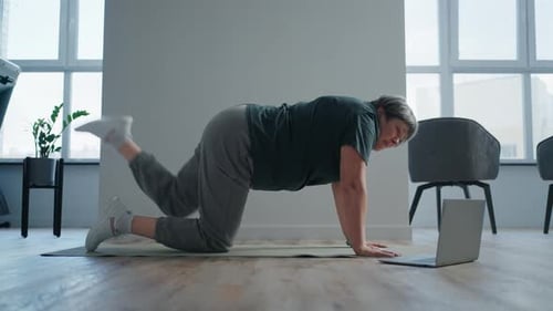 Senior Woman Exercising at Home