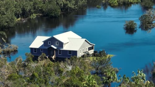 Surrounded By Hurricane Ian Rainfall Flood Waters Farm Home in Florida Residential Area