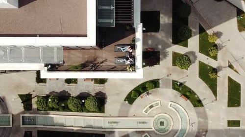 An Aerial View of a Modern Urban Landscape Featuring Unique Architecture and Design Elements