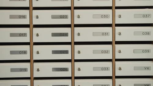 Mailboxes Showing Increasing Numbers in an Apartment Building