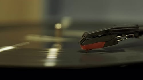 Close Up Of Record Player Playing Vinyl Record