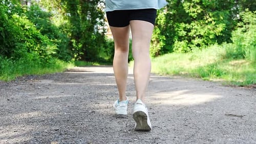 Young Woman Runner Training in Summer Park Close Up Fitness Woman Jogging Outdoor Morning Running