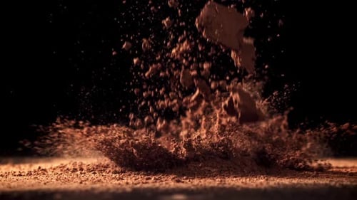 Cocoa Powder Falls on the Table Filmed on a Highspeed Camera at 1000 Fps