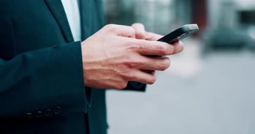 Hands, smartphone and business man in city typing, communication and chat with networking