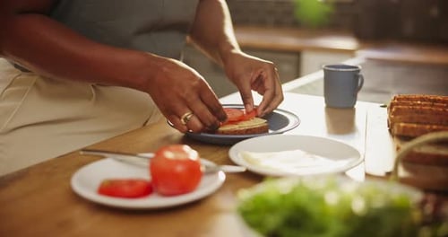Making Healthy Sandwich with Tomatoes and Lettuce