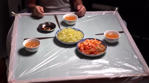 People Share a Meal Together at Home