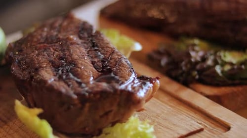 Delicious Steak with Fresh Lettuce and Pepper