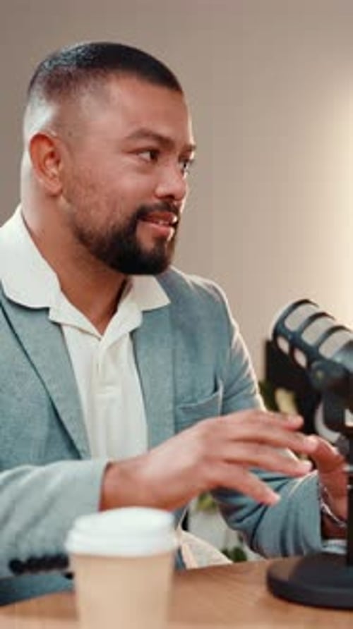 Podcast, talking or man in studio with microphone, discussion or personal story in streaming show