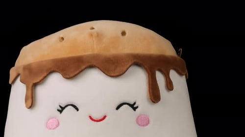 Stuffed and fluffy toy pillow playing and dancing. Alpha channel included.