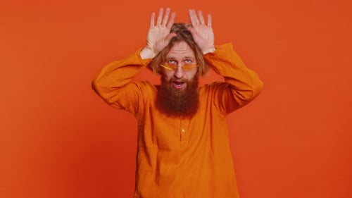 Adult Making Silly Faces with Orange Glasses