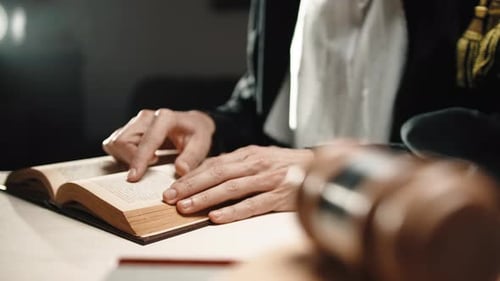 Law Book Read With Gavel Close Up