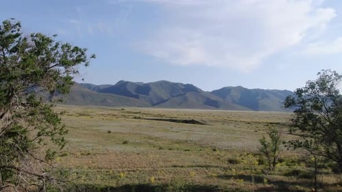 Peaceful Valley and Distant Mountains Aerial