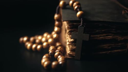 Holy Bible and Wooden Cross on the Desk Spirituality Religion and Hope Concept Symbol of