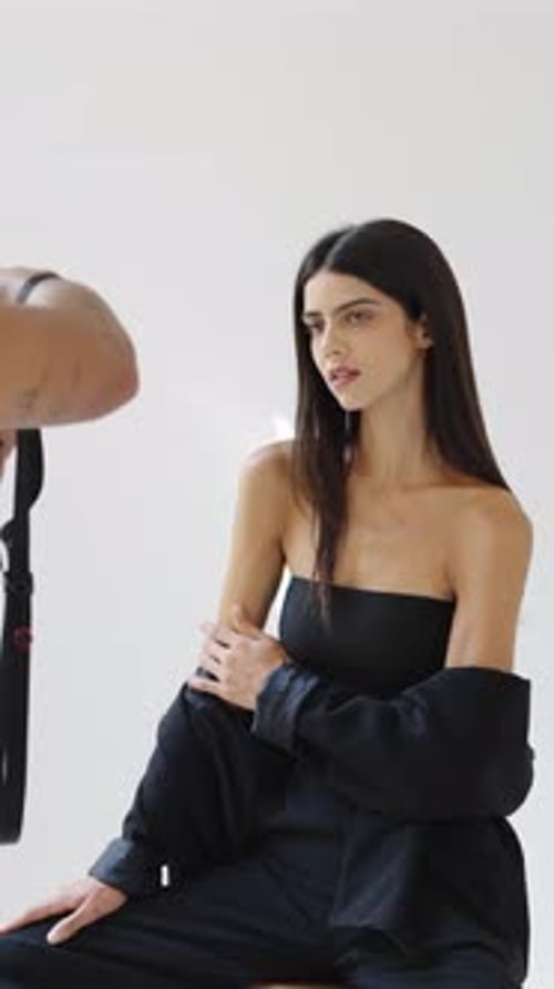 Elegant Woman Posing in Fashion Studio