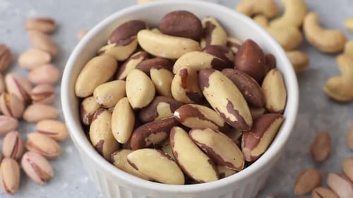 Brazil nuts, raw and shelled, are a source of selenium and a healthy food ingredient. Brazil nuts
