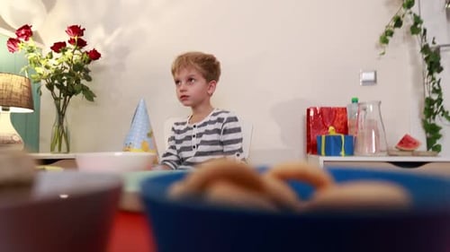 Boy Celebrates Birthday with Father at Home