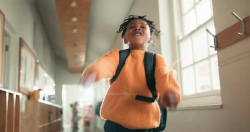 Dancing, student and boy in school, energy or celebration for good grades, moves and fun in hallway