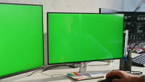 Two Mockup Monitors Placed at Light Office Table Zoom Out Man Working Computer