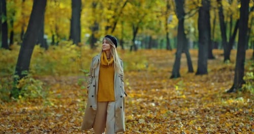 Pretty Young Woman Walking Alone in Park in Autumn Day Fulllength Portrait in Nature Prores