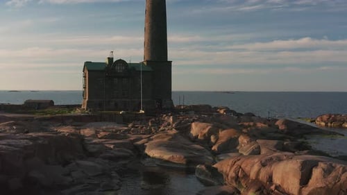 Aerial view of Bengtskär lighthouse during setting sun. The lighthouse is the tallest lighthouse in
