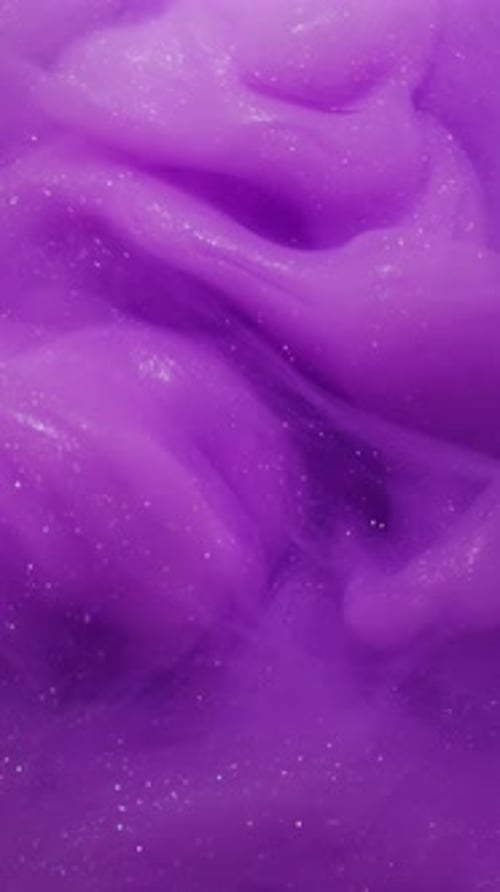 Swirling Purple Paint Abstract Background