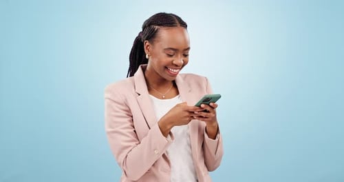 Happy Woman Using Smartphone and Laughing