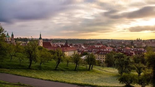 Sunrise timelapse of Prague, Czech Republic as seen from the orchards of Petřín gardens with a view