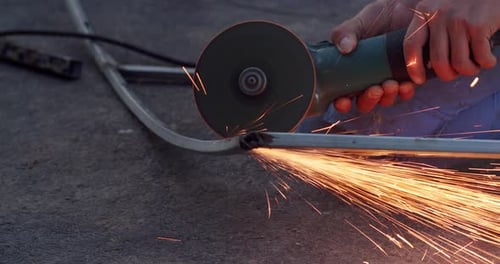 Blacksmith Performing Welding Repair Work Using Professional Equipment Blacksmith Cutting Metal