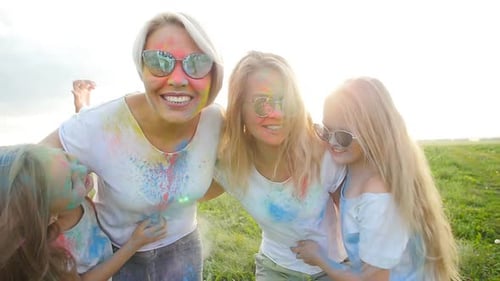 Happy Friends Celebrate Holi Together in Field
